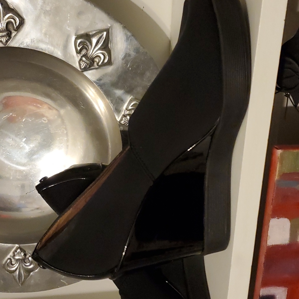 Slip on peep toe black heels